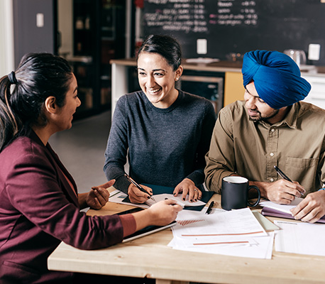 Couple meeting with their financial advisor